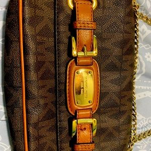 Cute Michael Korda bag with gold chain.